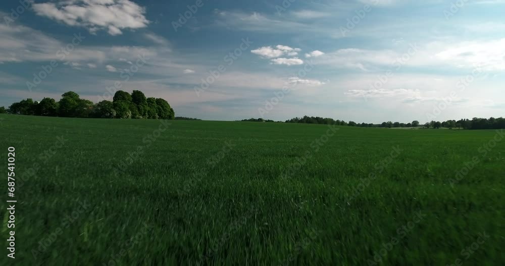 Aerial: Scenic View Of Natural Green Landscape While Drone Flying Forward Under Clouds On Sunny Day - Mariefred, Sweden Aerial: Scenic View Of Natural Green Landscape While Drone Flying Forward Under Clouds On Sunny Day - Mariefred, Sweden