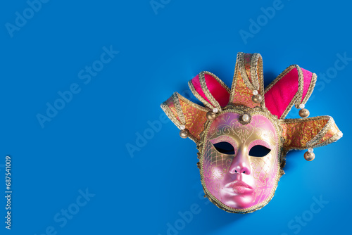 Venetian Carnival mask on blue background, masquerade ball, traditional festival