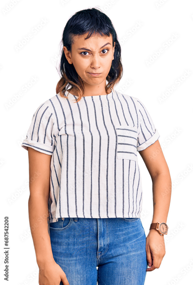 Young woman wearing casual clothes skeptic and nervous, frowning upset because of problem. negative person. Young woman wearing casual clothes skeptic and nervous, frowning upset because of problem. negative person.