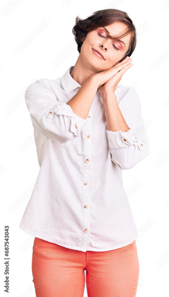 Beautiful young woman with short hair wearing elegant white shirt sleeping tired dreaming and posing with hands together while smiling with closed eyes. Beautiful young woman with short hair wearing elegant white shirt sleeping tired dreaming and posing with hands together while smiling with closed eyes.