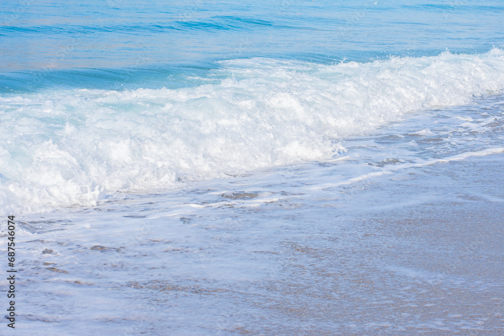 Natural background with oceanside sea waves with ащфь.Shore with copy space,tourism,vacation Natural background with oceanside sea waves with ащфь.Shore with copy space,tourism,vacation