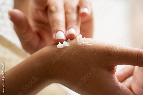 woman applying nail polish