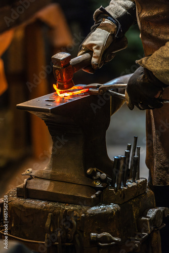 A blacksmith at work.