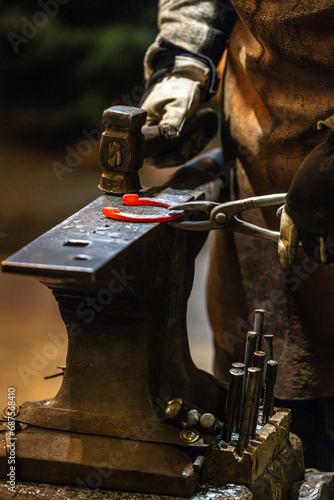 A blacksmith at work.