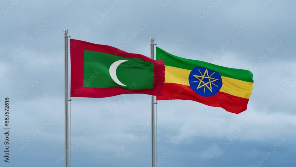Ethiopia flag and Maldives flag waving together on cloudy sky, endless seamless loop, two country relations concept Ethiopia flag and Maldives flag waving together on cloudy sky, endless seamless loop, two country relations concept