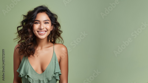 Indian woman model wear green sundress isolated on pastel background