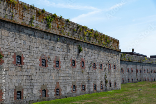 View of part of the outside walls of a former United States Army coastal fortification Fort Adams in Fort Adams State Park, Newport, RI, USA photo