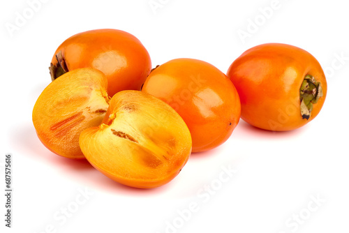 Fototapeta Naklejka Na Ścianę i Meble -  Fresh Ripe Persimmons, isolated on white background.