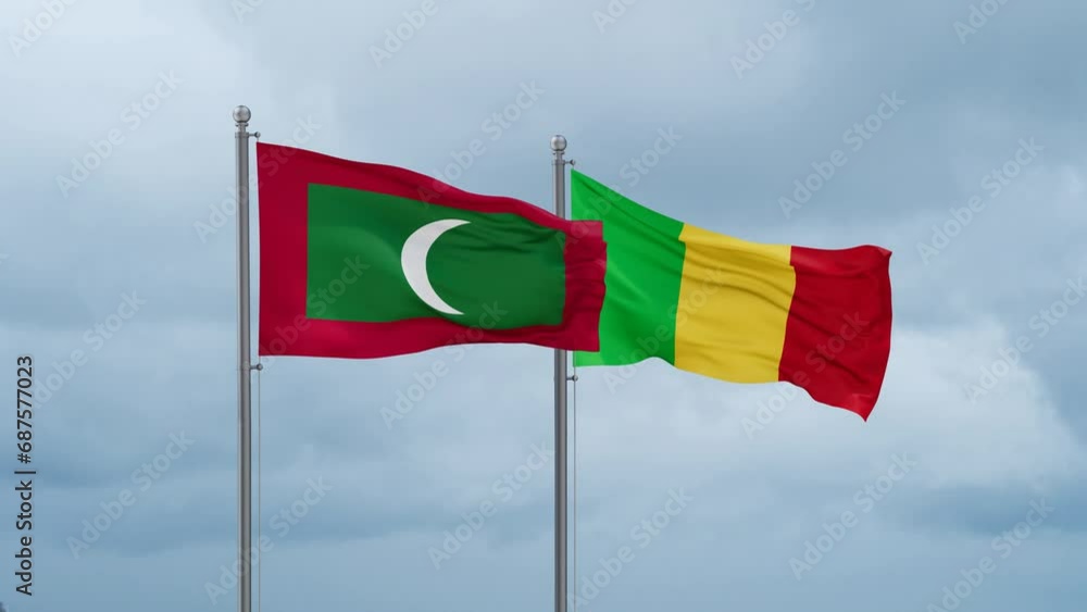 Mali and Maldives flags waving together on cloudy sky, endless seamless loop, two country relations concept Mali and Maldives flags waving together on cloudy sky, endless seamless loop, two country relations concept