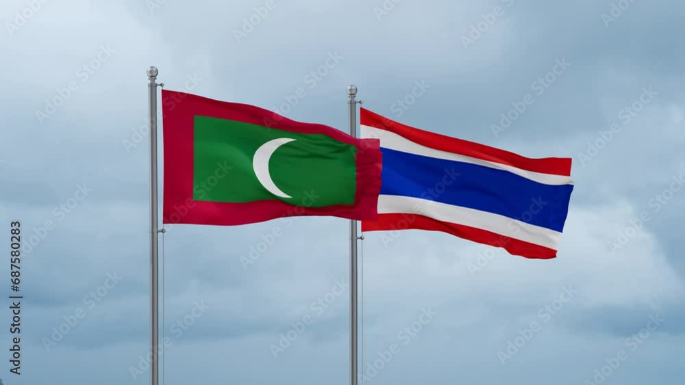 Kingdom of Thailand and Maldives flag waving together on cloudy sky, endless seamless loop, two country cooperation concept Kingdom of Thailand and Maldives flag waving together on cloudy sky, endless seamless loop, two country cooperation concept