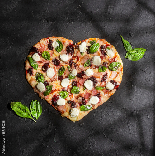 Forest fruit pizza baked and served at the table photo