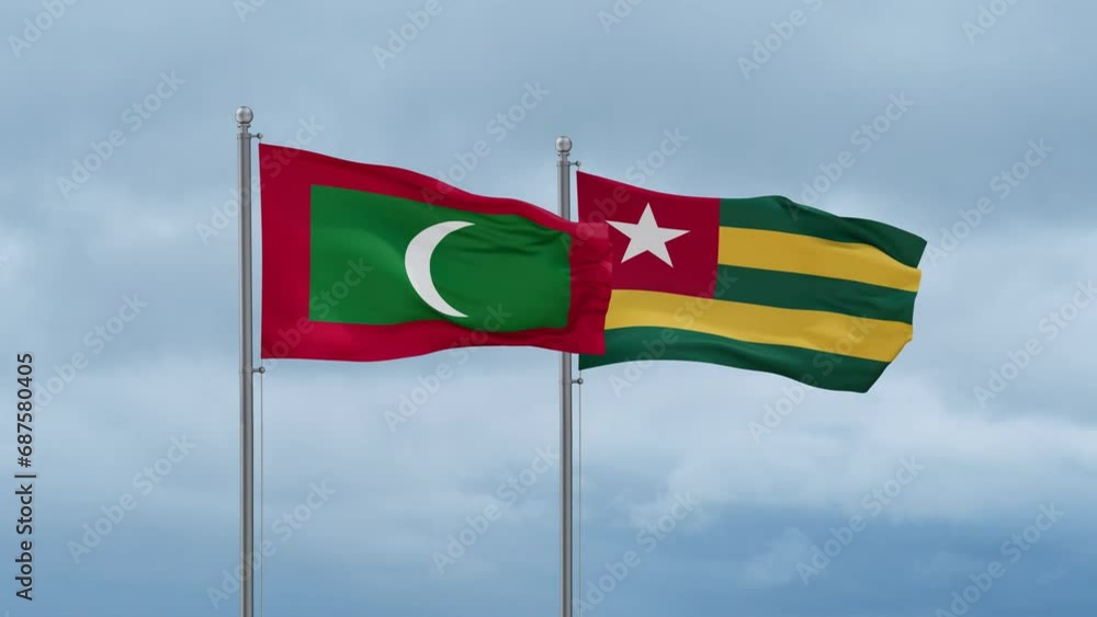 Togo, Togolese Republic and Maldives flag waving together on cloudy sky, endless seamless loop, two country cooperation concept Togo, Togolese Republic and Maldives flag waving together on cloudy sky, endless seamless loop, two country cooperation concept