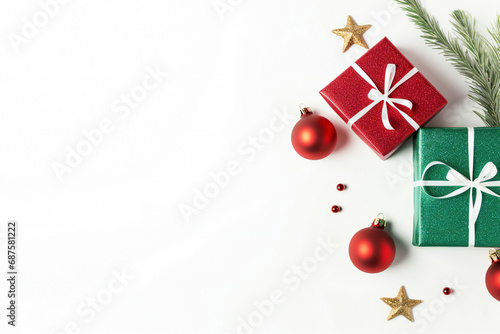 Christmas background. Gift boxes, baubles and fir leaves on white background with copy space. Flat lay or top view. High quality photo