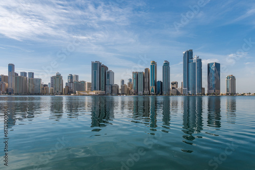 Panorama of the center of the Emirate of Sharjah, United Arab Emirates . Corniche area of Sharjah, UAE city.