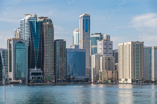 Panorama of the center of the Emirate of Sharjah, United Arab Emirates . Corniche area of Sharjah, UAE city. © Extraded