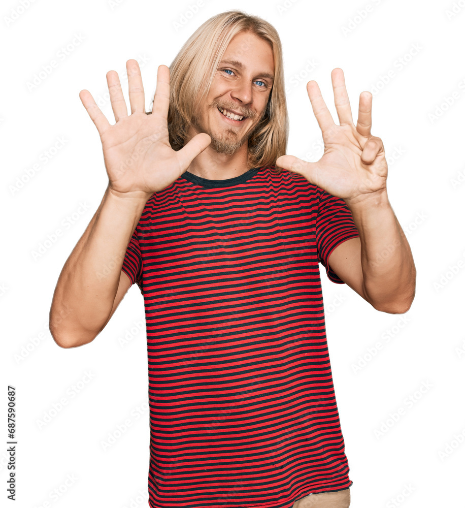 Caucasian man with blond long hair wearing casual striped t shirt showing and pointing up with fingers number nine while smiling confident and happy. Caucasian man with blond long hair wearing casual striped t shirt showing and pointing up with fingers number nine while smiling confident and happy.