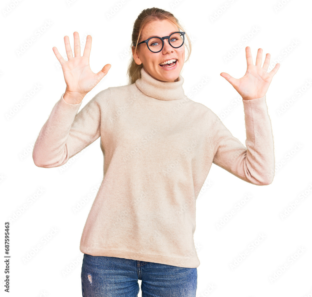 Young beautiful blonde woman wearing turtleneck sweater and glasses showing and pointing up with fingers number ten while smiling confident and happy. Young beautiful blonde woman wearing turtleneck sweater and glasses showing and pointing up with fingers number ten while smiling confident and happy.