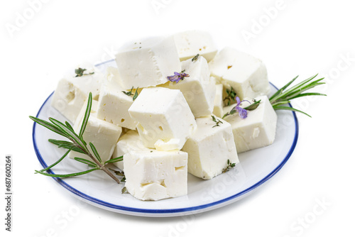 cbes of Feta cheese isolated on white background clipping Heap of Feta cheese, basil leaves and tomatoes.