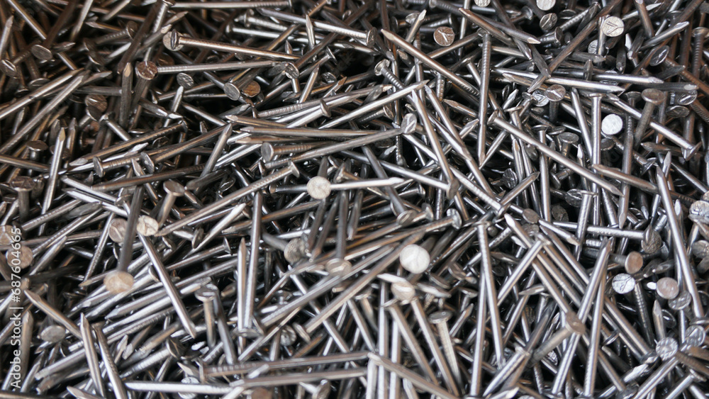 close up of a pile of nails close up of a pile of nails