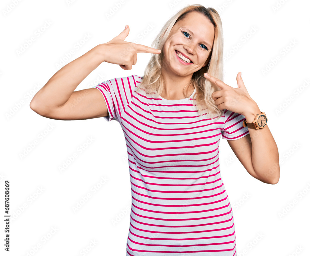 Young caucasian woman wearing casual clothes smiling cheerful showing and pointing with fingers teeth and mouth. dental health concept. Young caucasian woman wearing casual clothes smiling cheerful showing and pointing with fingers teeth and mouth. dental health concept.