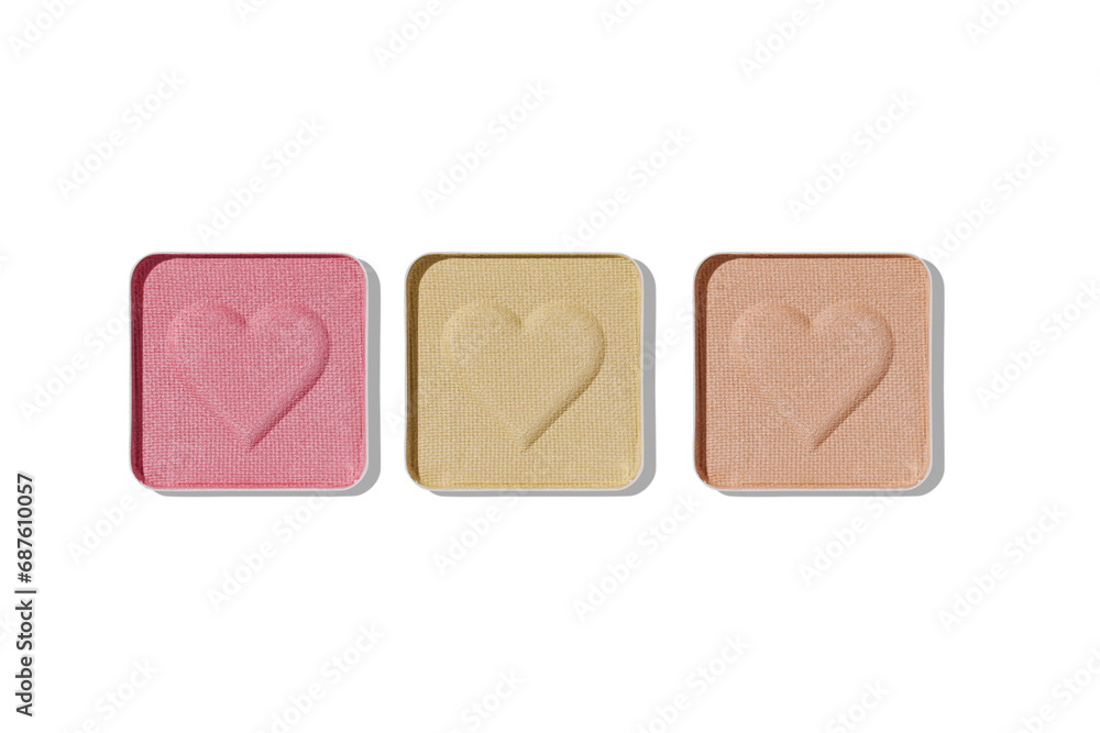 Top view of set pastel color eye shadow swatch isolated on white background with shadow, eyeshadows with heart imprint, colored powder for makeup, square shape in metal pack, design object Top view of set pastel color eye shadow swatch isolated on white background with shadow, eyeshadows with heart imprint, colored powder for makeup, square shape in metal pack, design object