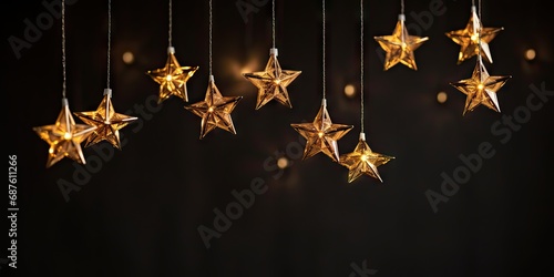 Elegant Hanging Golden Stars and Glowing Bokeh Lights on a Dark Festive Background – Christmas or New Year Celebration Concept