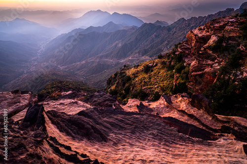 Colorful landscape background at sunrise in the Asir Mountains in Saudi Arabia. © Szymon Bartosz