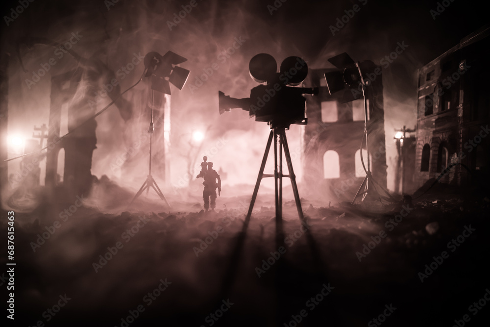 Action (War) movie concept. Man moving out with little boy from burned out city destroyed in war. Military fighting silhouettes.