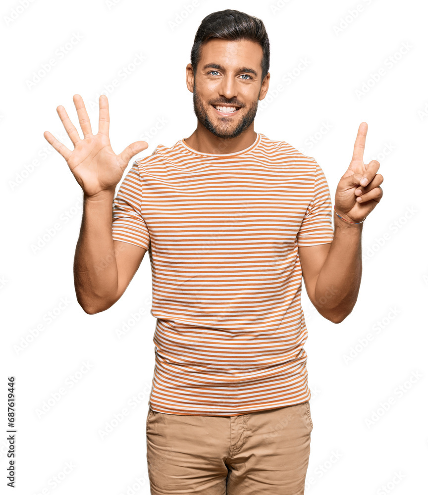 Naklejka premium Handsome hispanic man wearing casual clothes showing and pointing up with fingers number six while smiling confident and happy.