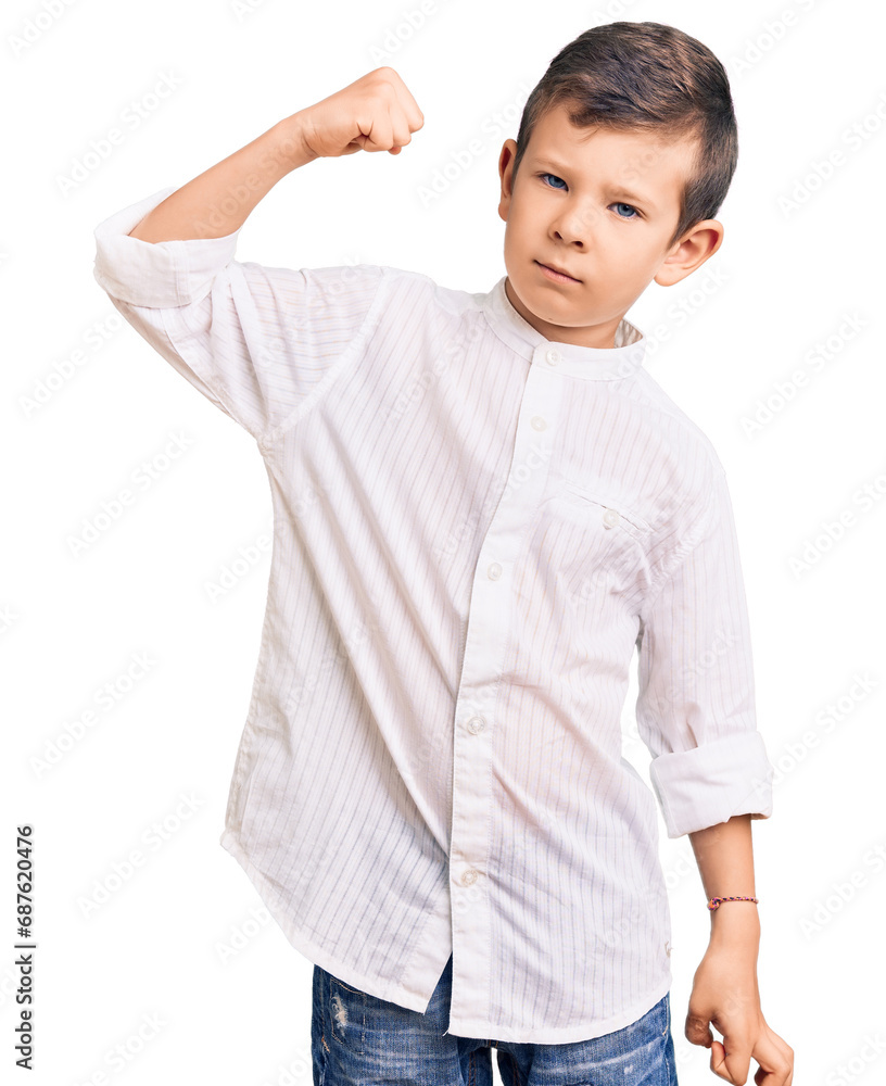 Cute blond kid wearing elegant shirt strong person showing arm muscle, confident and proud of power Cute blond kid wearing elegant shirt strong person showing arm muscle, confident and proud of power