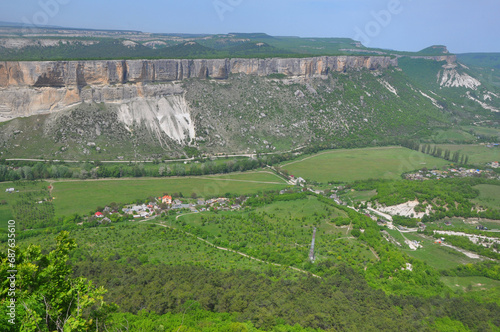 The village of Bashtanovka is at the foot of the Pychki-Kaya-Bash plateau. View from above. Crimea