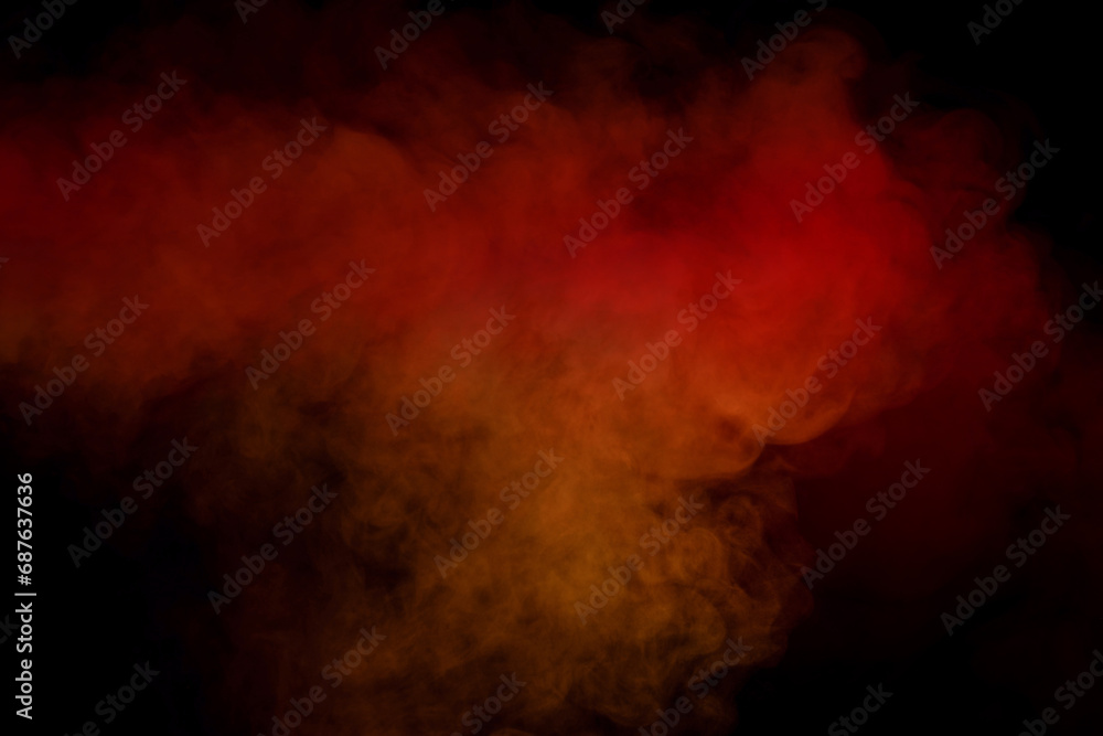 Orange and red steam on a black background. Orange and red steam on a black background.