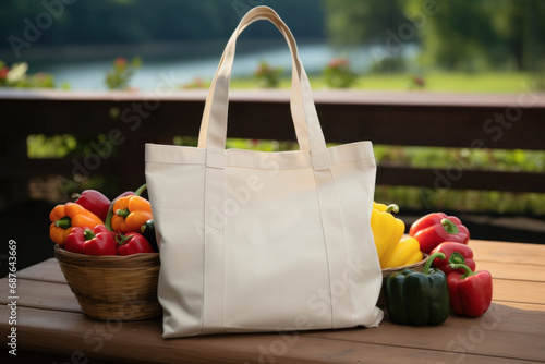 Tote bag mockup template on shelf in grocery store with fresh and organic fruits and vegetables. Eco friendly totebag mock up. Sustainable and zero waste lifestyle
