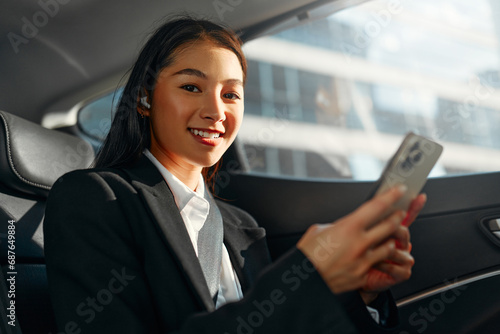 Businesswoman sitting in car
