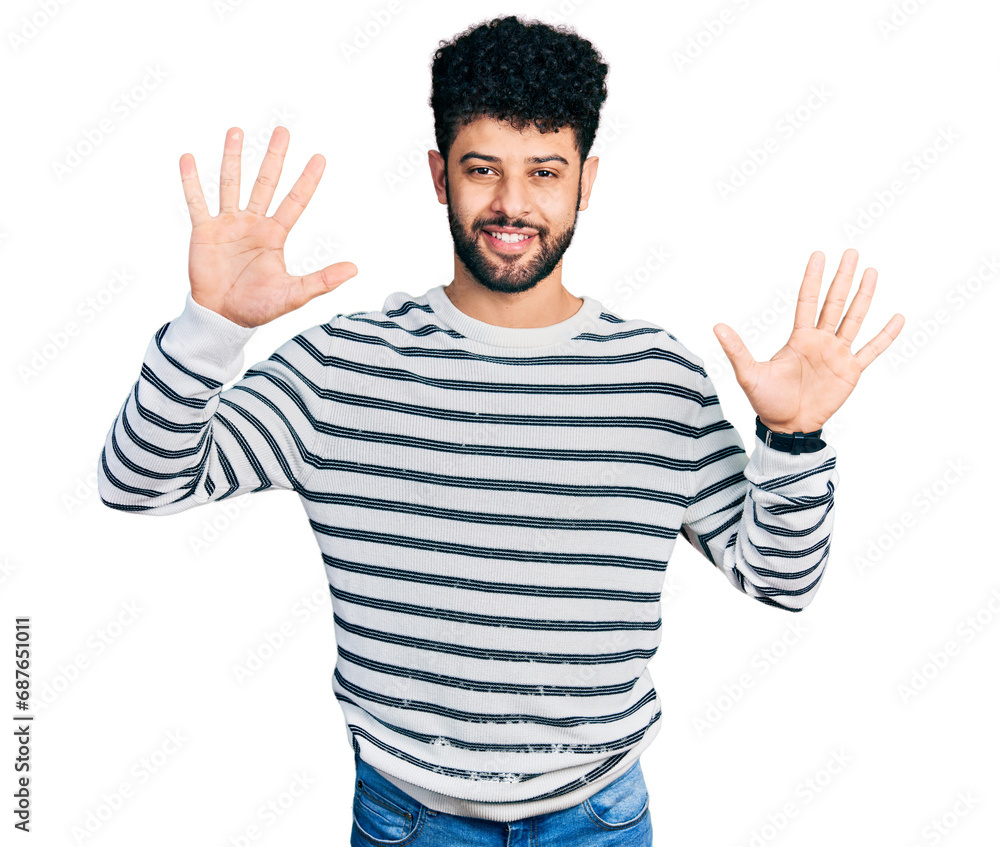 Young arab man with beard wearing casual striped sweater showing and pointing up with fingers number ten while smiling confident and happy. Young arab man with beard wearing casual striped sweater showing and pointing up with fingers number ten while smiling confident and happy.