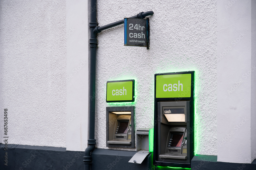 Cash machine in wall outside bank in city centre Cash machine in wall outside bank in city centre