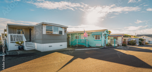 Mobile home park. A row of residential mobile park homes in a small town somewhere in California, street view. Lifestyle, architecture photo