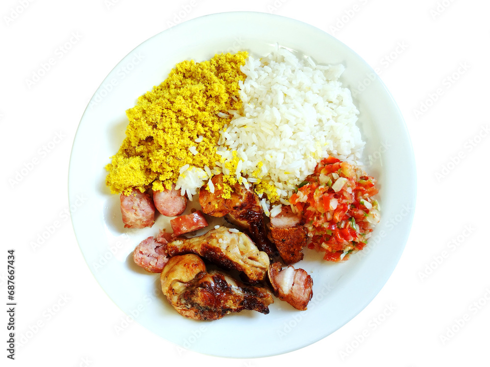 Top view of Brazilian meal called Prato Feito, served on typical Brazilian barbecue with Top view of Brazilian meal called Prato Feito, served on typical Brazilian barbecue with