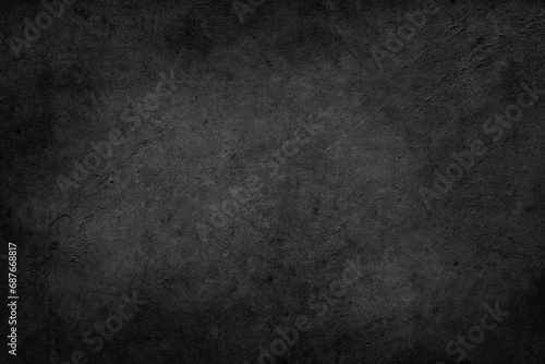 Textured grunge dark black concrete background photo