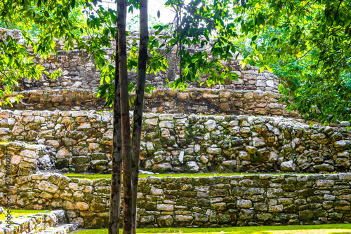 Coba Maya Ruins ancient buildings pyramids in tropical jungle Mexico.