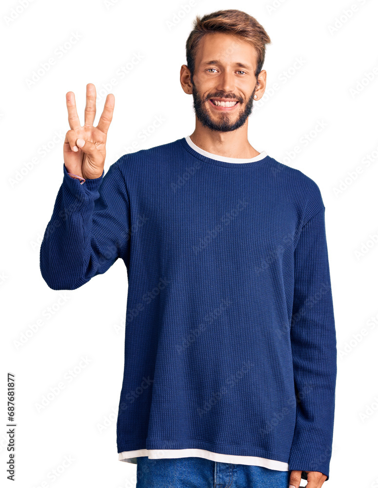 Handsome blond man with beard wearing casual sweater showing and pointing up with fingers number three while smiling confident and happy. Handsome blond man with beard wearing casual sweater showing and pointing up with fingers number three while smiling confident and happy.
