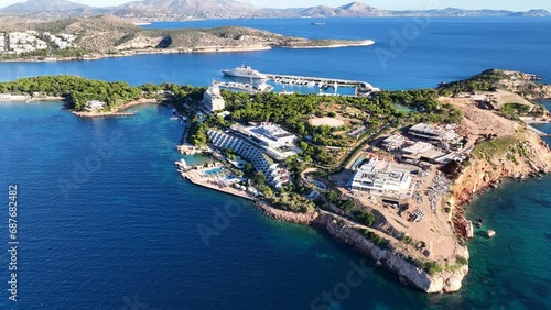 Aerial drone cinematic video of amazing recently renovated Astir Marina with luxury yachts and sail boats  in paradise Peninsula of Vouliagmeni, Athens Riviera, Attica, Greece