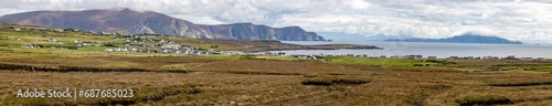 Panorama of bog with village and mountains in background © lisandrotrarbach