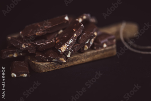 chocolate bar with chocolate,Broken dark chocolate bars. View from above.chocolate background