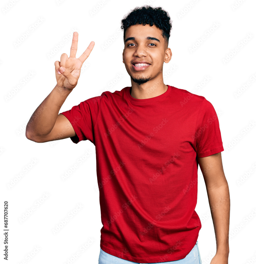 Fototapeta premium Young african american man wearing casual red t shirt showing and pointing up with fingers number two while smiling confident and happy.