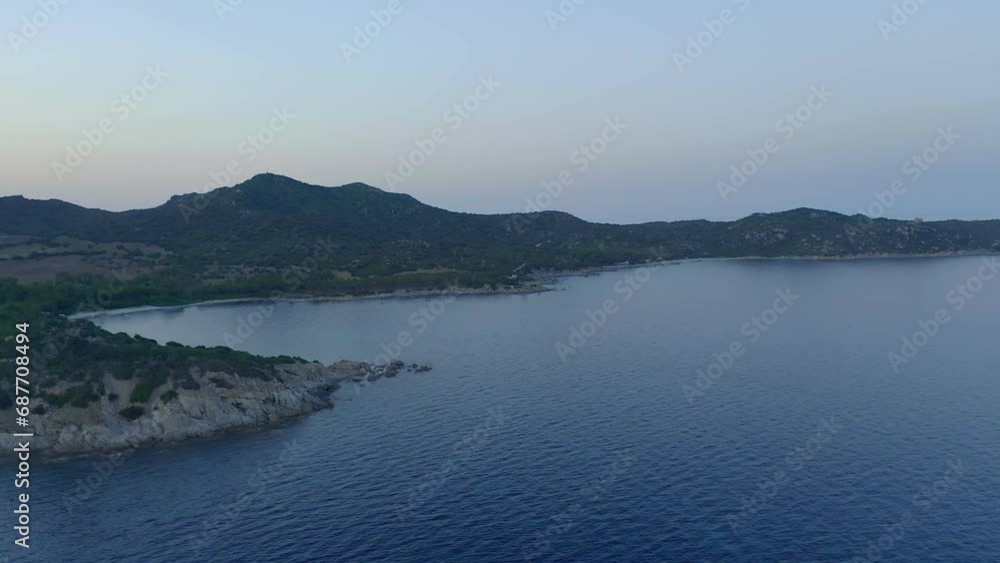 Aerial drone view of coastline of Sardinia in Capo Ferrato cape with white sand beaches and turquoise water at sunset, in Italy Aerial drone view of coastline of Sardinia in Capo Ferrato cape with white sand beaches and turquoise water at sunset, in Italy