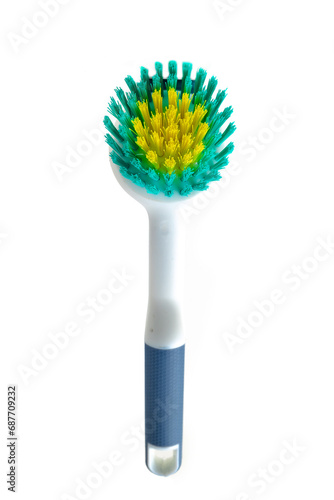 Dishwashing brush made of ecological plastic with rubber handle and colored bristles. Isolated on white background.