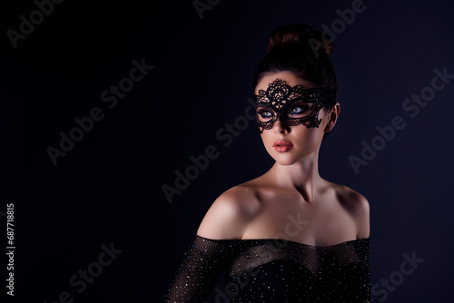 Photo of stunning lady in gothic masquerade style queen mask at private night party isolated on dark color background