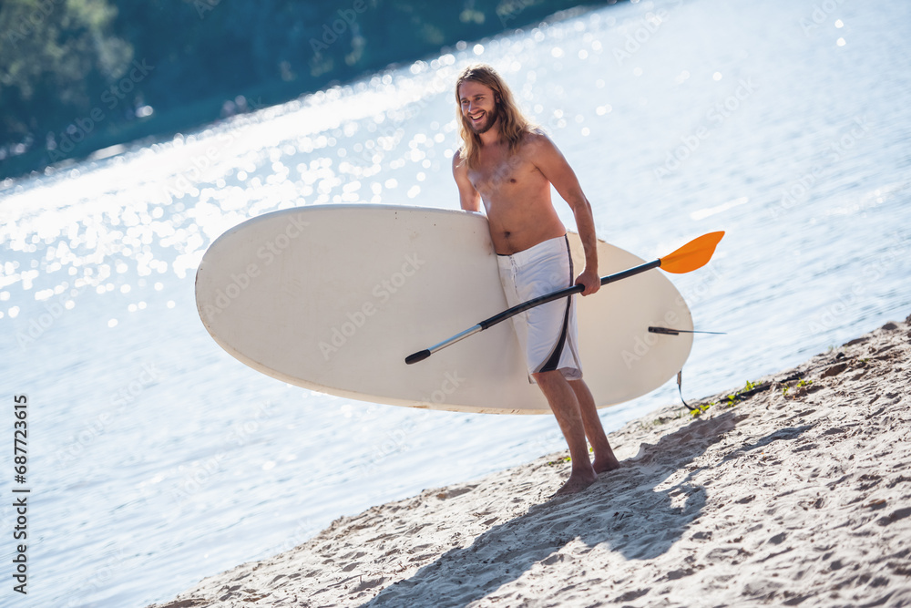 Man standup paddleboarding