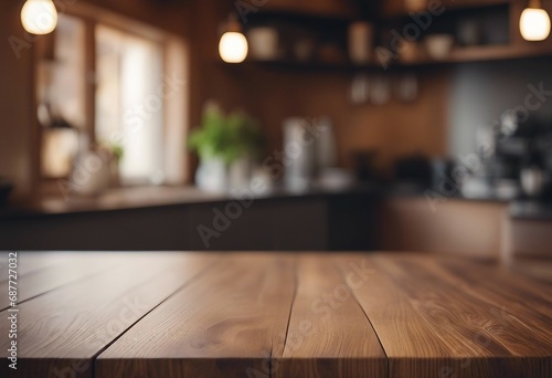 Wooden table on blurred kitchen bench background Empty wooden table and blurred kitchen background © ArtisticLens